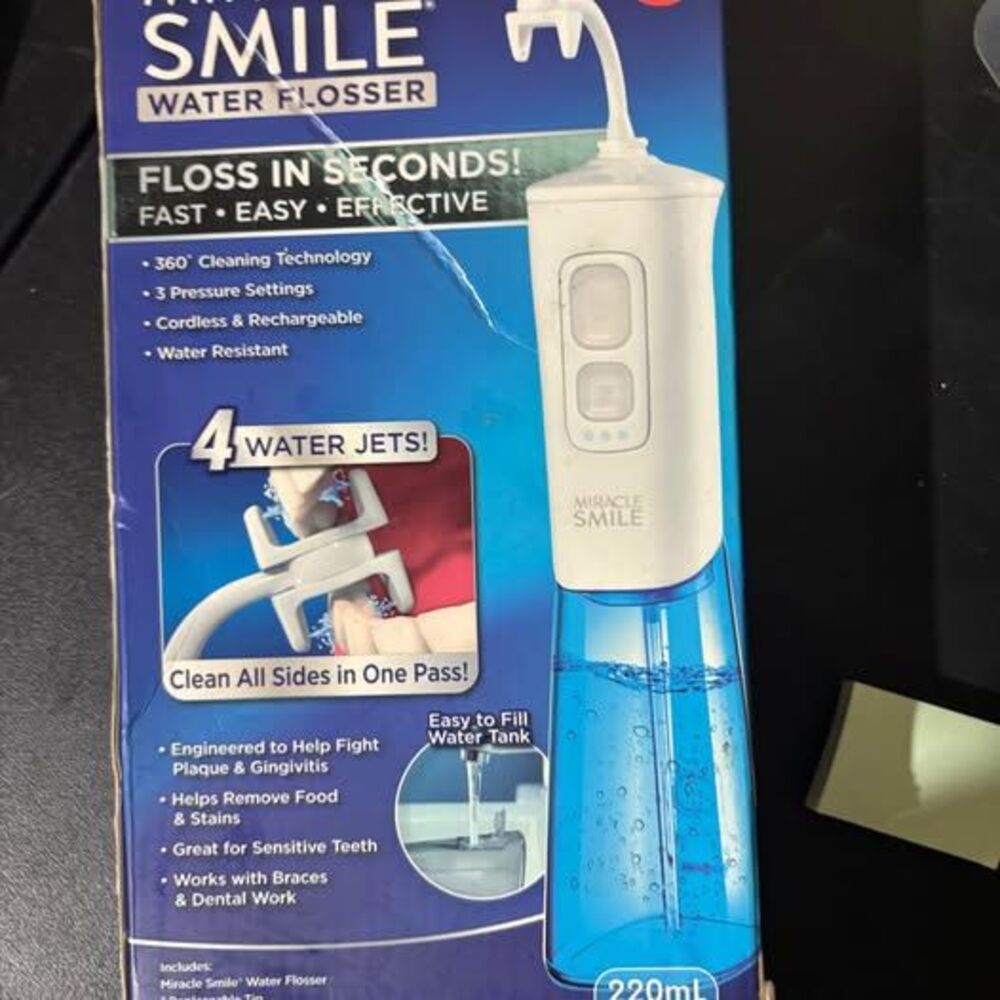 Miracle Smile Water Flosser 4-Jet Cordless Rechargeable Oral Irrigator
